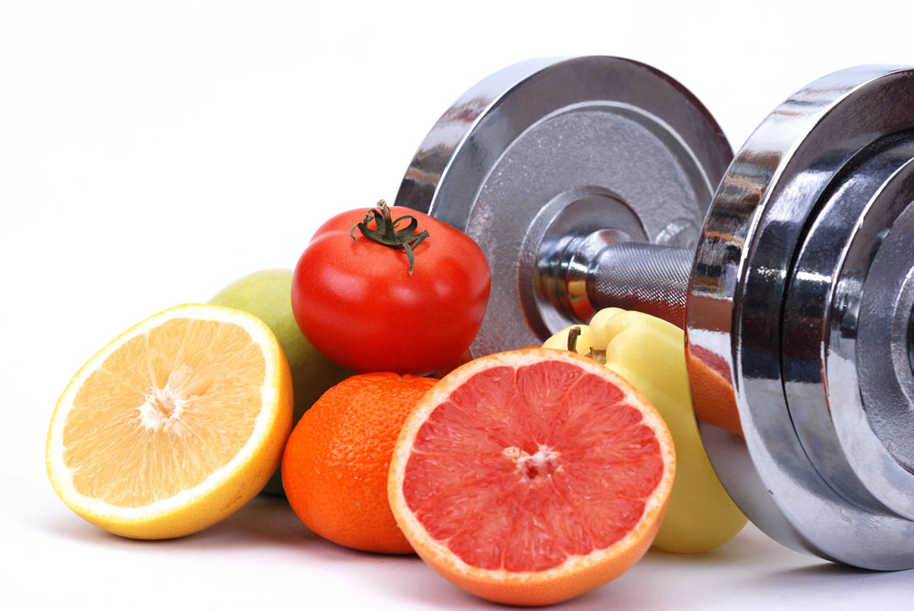 assorted-fruits-next-to-a-dumbell